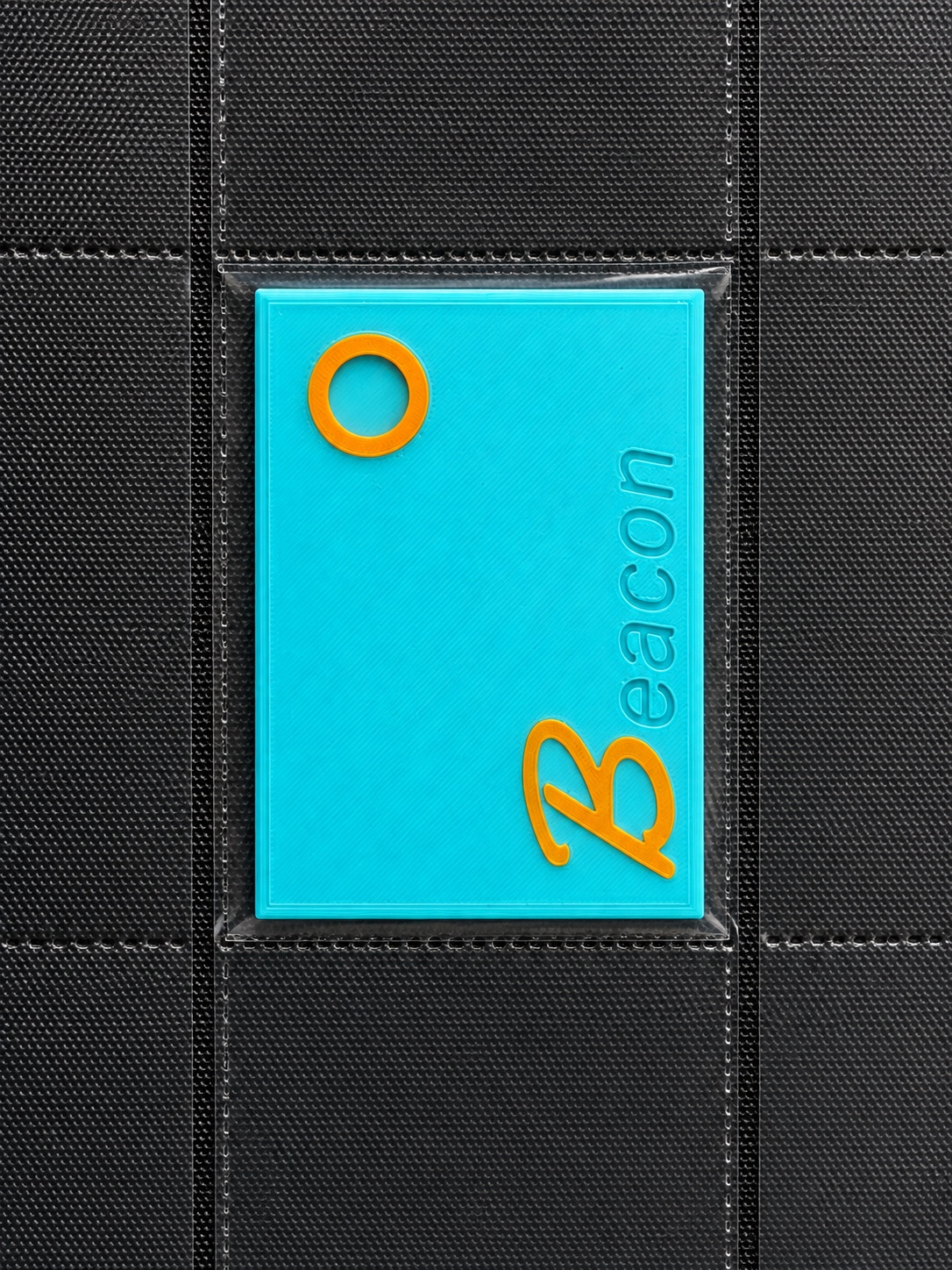 Binder Beacon inserted into a transparent binder pocket